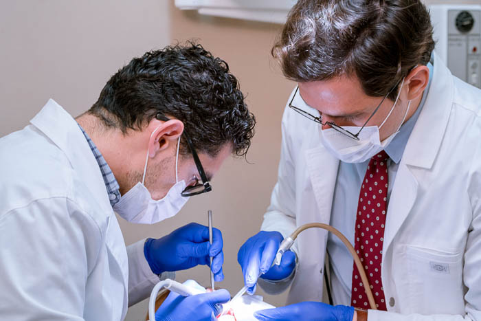 The patient is undergoing a consultation for a 4 on 1 treatment in Mexico.