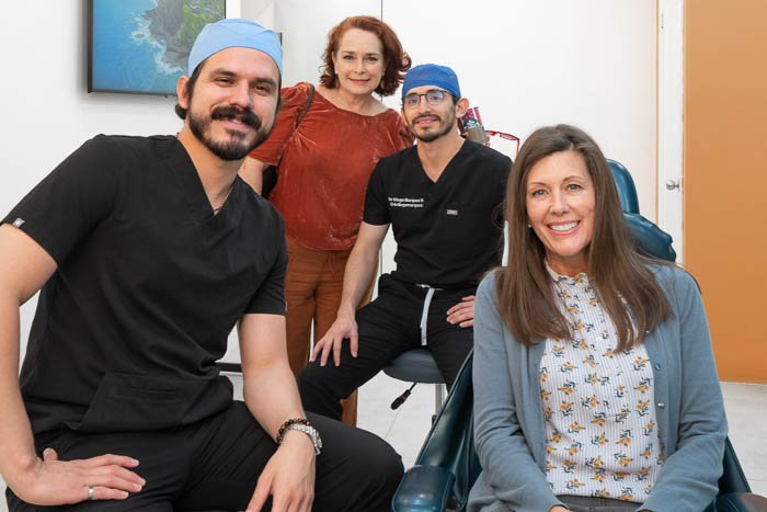 All on 4 doctors and patients are all smiles after treatment in Mexico.