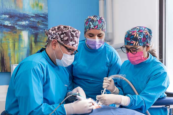 Lumineer specialists working on a patient in Mexico.