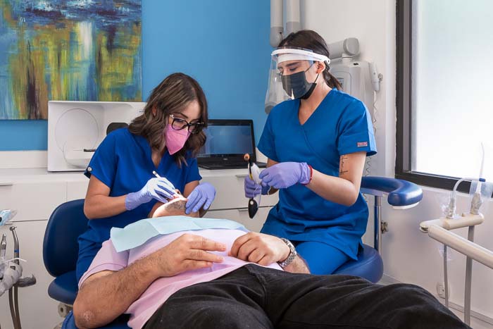 Lumineer specialists working on a patient in Mexico.