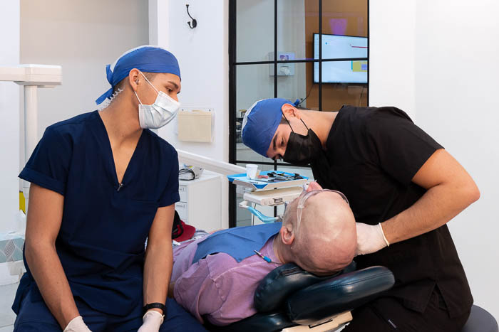 The patient is having a consultation for tranditional dentures in Mexico